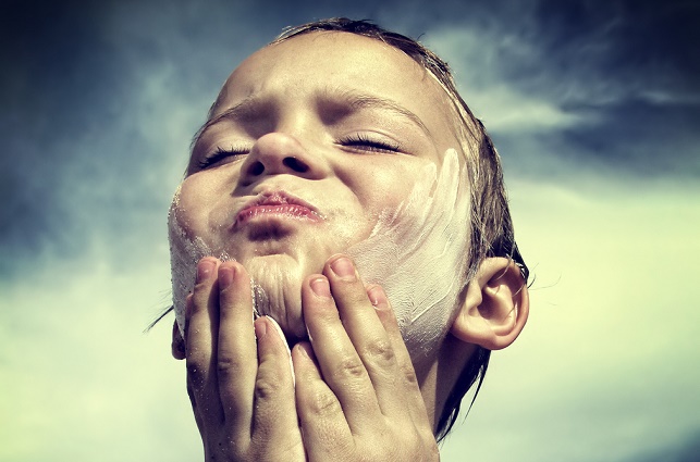 How do the chemicals in sunscreen protect our skin from damage?